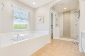 Bathtub, hair dryer, towels, soap
