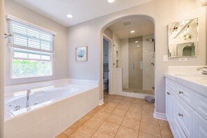 Bathtub, hair dryer, towels, soap