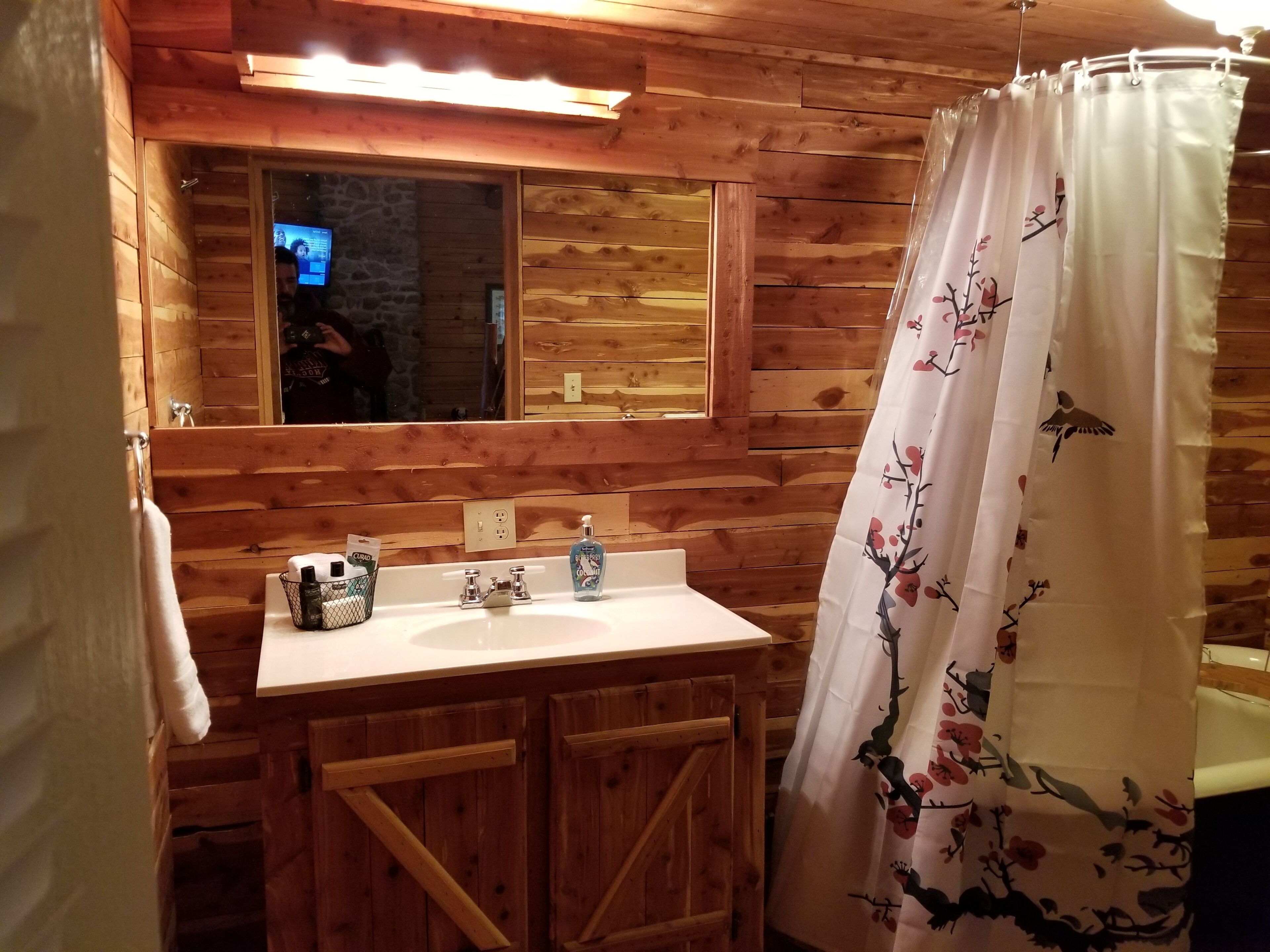 Combined shower/tub, towels, soap, shampoo