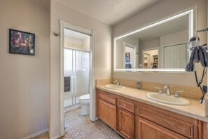 Bathtub, hair dryer, towels, soap