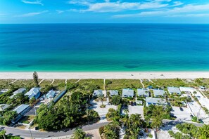 On the beach, sun-loungers, beach towels - Casey Key Beachfront Escape: Charming 1BR Cottage (Nokomis)