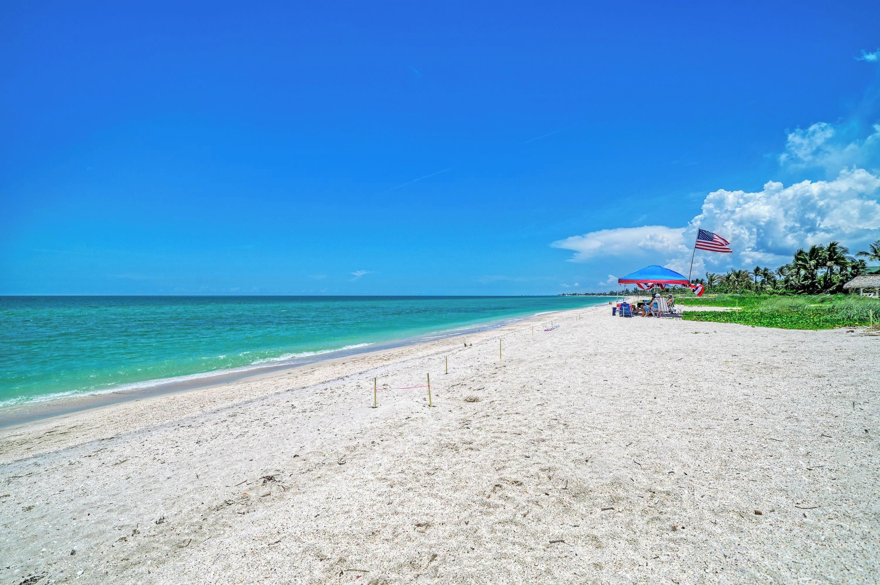 On the beach, sun-loungers, beach towels