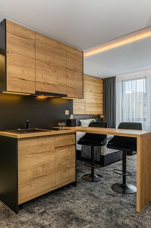 Business Executive With Kitchinette | Minibar, système d’insonorisation, accès au Wi-Fi (inclus)