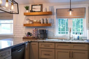 Coffee/tea maker, fridge, microwave, oven