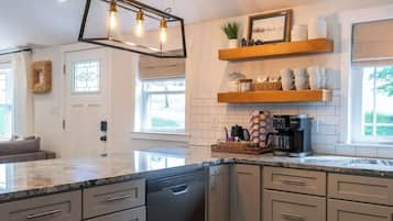 Coffee/tea maker, fridge, microwave, oven