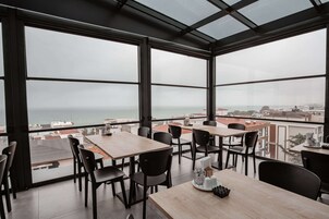 Breakfast, lunch, dinner served; beach views