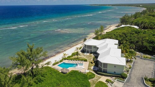 Beachfront Peace!  Awesome top floor condo on Caribbean plus military discount!