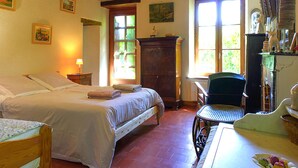 A room with a bed, a desk, a chair, a cabinet, and a window. - Beautiful home in Selles-sur-Cher with WiFi (Selles-sur-Cher)
