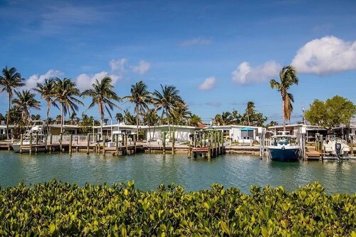 Stunning home on the canal with boat dock exclusive Key Colony Beach.