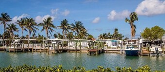 Stunning home on the canal with boat dock exclusive Key Colony Beach.