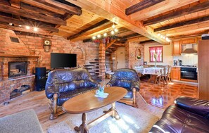 Smart TV, fireplace, table football, stereo