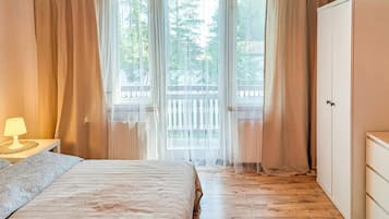 3 多间卧室、旅行婴儿床、免费 WiFi、床单