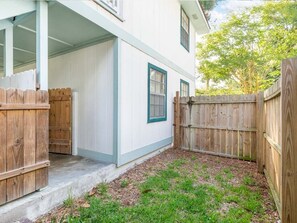 Enjoy a peaceful stay in this charming home with a covered porch and yard.