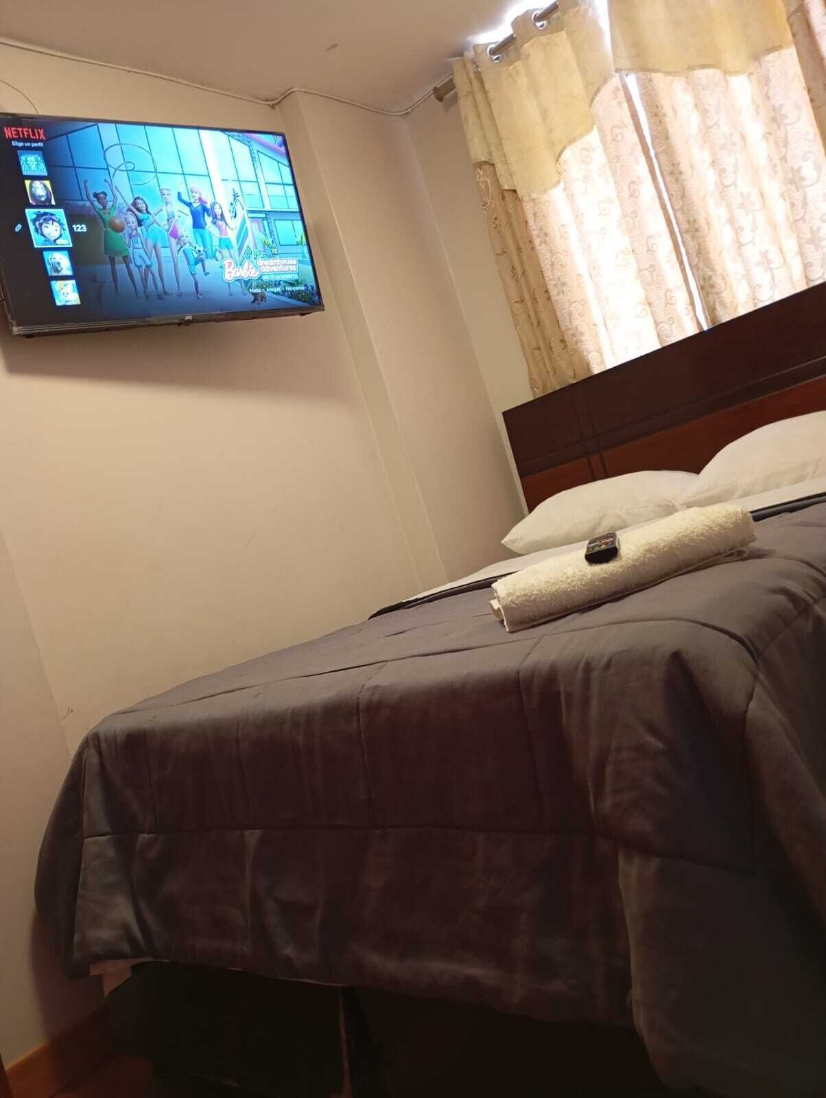 3 dormitorios, tabla de planchar con plancha, wifi gratis y ropa de cama