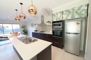 Electric kettle, high chair, dining tables