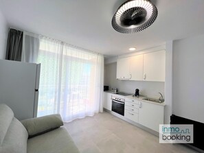 Living area - InmoBooking Loft Ancora, 5 minutes walk from the beach. (La Pineda)