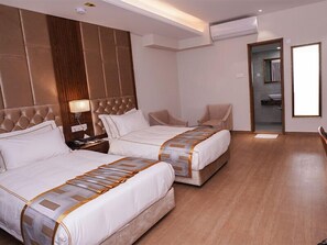 Premium kamer | Luxe beddengoed, donsdekens, een minibar met enkele gratis items