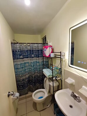 Shower, towels, soap, shampoo