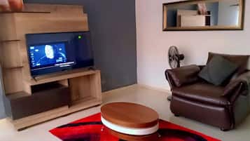 Apartment, 3 Bedrooms, Smoking, Balcony | Living room | TV