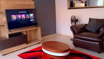 Apartment, 3 Bedrooms, Smoking, Balcony | Living room | TV