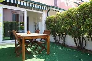 Villa, 3 Bedrooms, Patio | Outdoor dining - Cosy two - Storey Villa With a Garden and a Shared Swimming Pool (Caorle)