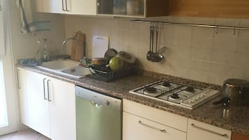 Dormitorio compartido, 1 habitación | Cocina privada