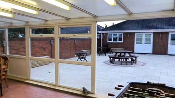 Apartment, 3 Bedrooms, Patio, Garden View | Games room