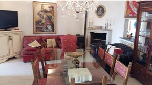 Shared Dormitory, 1 Bedroom, Smoking, Balcony | Living area | Flat-screen TV
