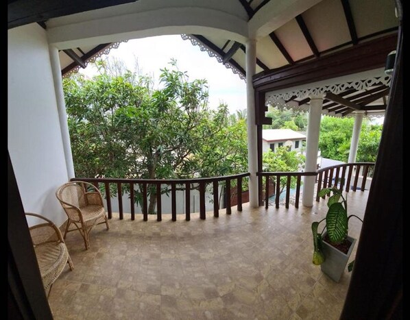 ห้องพักรวม, 1 ห้องนอน, ระเบียง, วิวสวน | บริเวณที่พัก