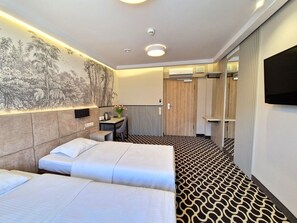 Chambre Standard avec lits jumeaux | Fer et planche Ă repasser, Wi-Fi gratuit, draps fournis