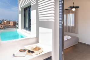 Superior Suite with City View and Outdoor Hot Tub | Soundproofing, free WiFi, bed sheets - North Wind Luxury Suites (Santorini)