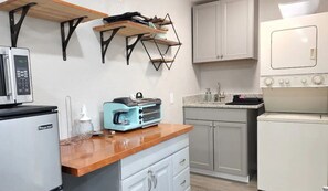 Microwave, coffee/tea maker, toaster, dining tables