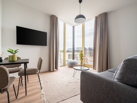 Suite with Sofa Bed & Balcony | Living area | Smart TV