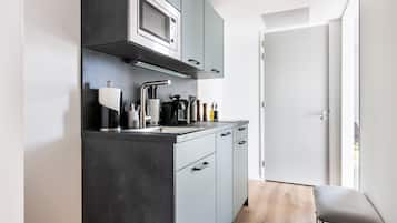 Suite with Sofa Bed & Balcony | Private kitchen | Fridge, coffee/tea maker, electric kettle, toaster