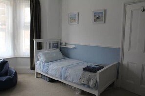 4 bedrooms, desk, iron/ironing board, travel cot