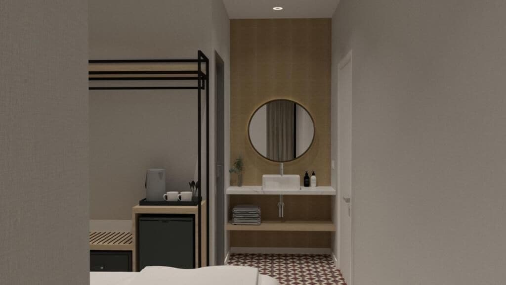 Un baño moderno con inodoro empotrado, lavamanos, espejo y barra para toallas.