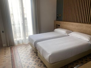 Down comforters, memory foam beds, minibar, in-room safe