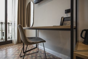 Habitación cuádruple | Edredones de plumas, colchones viscoelásticos, minibar y caja fuerte