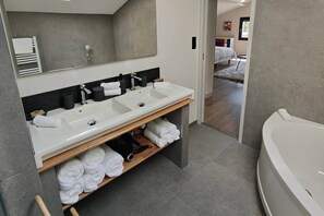 Bathtub, hair dryer, towels