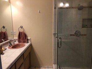 Combined shower/tub, hair dryer, towels, soap