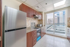 อพาร์ทเมนท์ (1 Bedroom) | ครัวส่วนตัว | ตู้เย็น, ไมโครเวฟ, เตาอบ, กาต้มน้ำไฟฟ้า