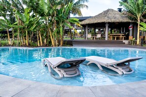 Outdoor pool, pool umbrellas, pool loungers