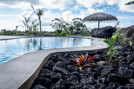 Outdoor pool, pool umbrellas, sun loungers