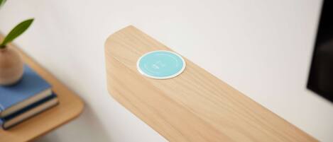 A wooden table with a blue circular object on it.