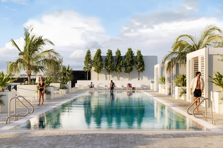 Outdoor pool, open 7:00 AM to 8:00 PM, cabanas (surcharge)