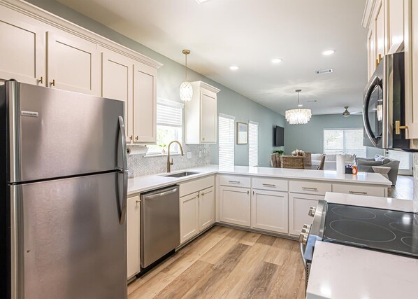 House, Multiple Beds, Balcony, Garden View | Private kitchen | Full-size fridge, microwave, oven, stovetop