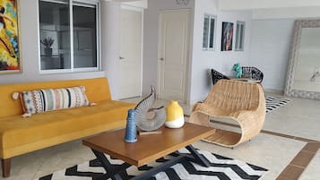Apartamento conforto | Área de estar | TV 32 polegadas com canais digitais