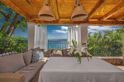 Villa with terrace and sea view