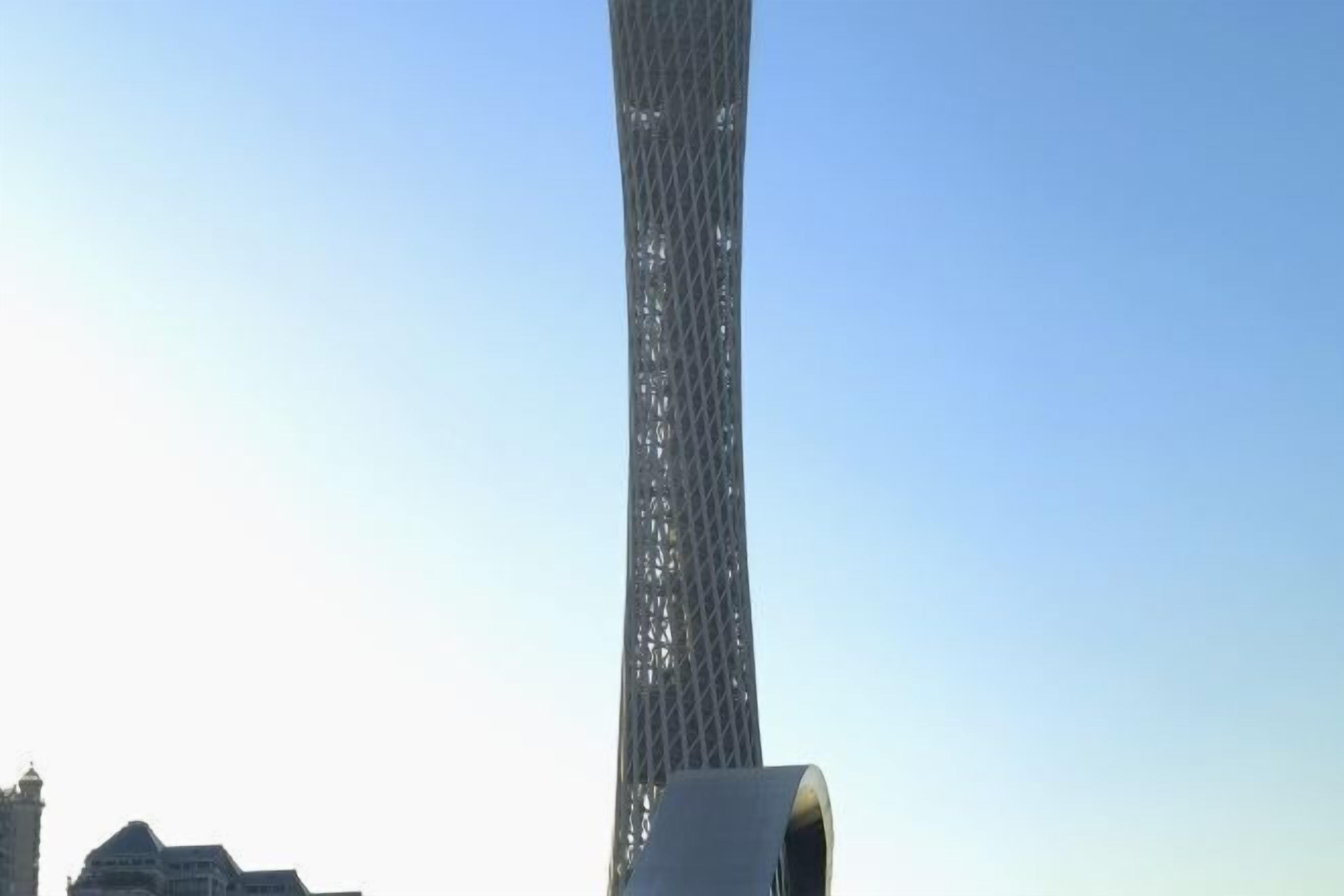 A tall, modern tower with a unique twisted design.