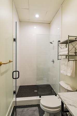 Shower, hair dryer, towels, soap